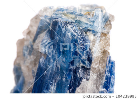 Macro mineral stone Kyanite a white background Macro mineral stone Kyanite a white background 104239993