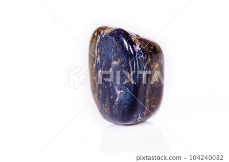 Macro mineral stone Petersit PAR on white background 104240082