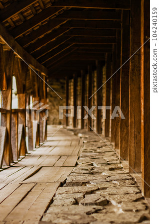 Long corridor of the defensive wall of the castle. Long corridor of the defensive wall of the castle. 104240159