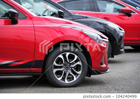 Mazda cars in line with dealers 104240499