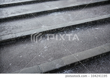 Crystals of salt on stairs, these gets slippery in winter when layer of ice forms top of surface 104241195