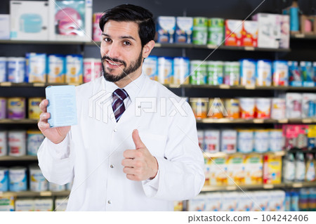 Positive specialist who is holding medicines Positive specialist who is holding medicines 104242406