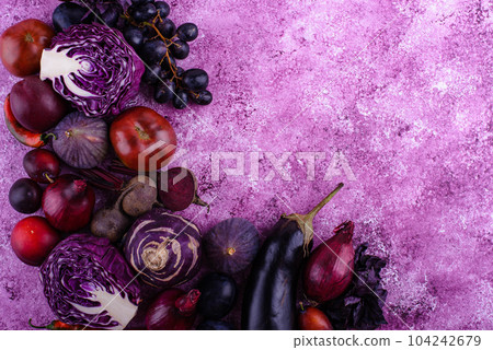 Assortment of purple vegetables on violet background 104242679