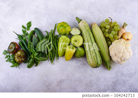 Assortment of yellow and red vegetables and fruits Assortment of yellow and red vegetables and fruits 104242713