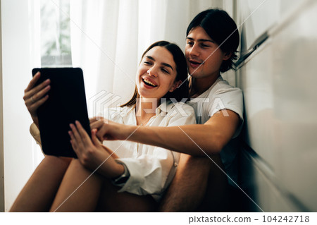 Couple of romantic young people at home, Vintage style photo Couple of romantic young people at home, Vintage style photo 104242718