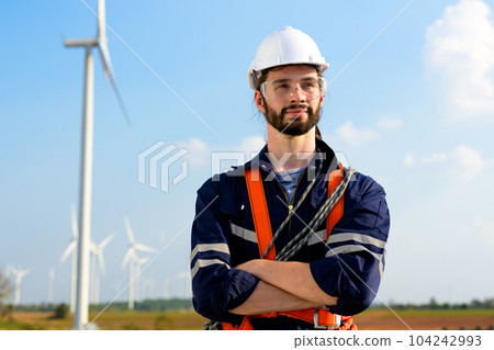 Renewable energy engineer working on wind turbine Renewable energy engineer working on wind turbine 104242993