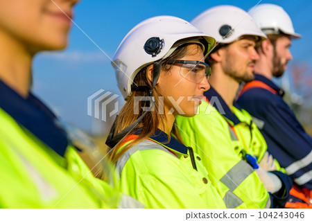 Renewable energy engineer working on wind turbine 104243046