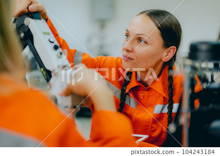 Engineer technician learning and operating in training program 104243184