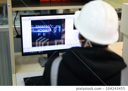 Quality control engineer specialist checking and inspecting circuit board 104243455