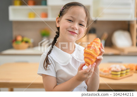 Children making bread in kitchen, Kids learning kitchen skill Children making bread in kitchen, Kids learning kitchen skill 104244211