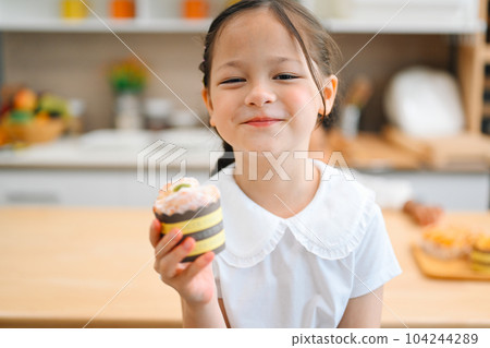 Children making bread in kitchen, Kids learning kitchen skill Children making bread in kitchen, Kids learning kitchen skill 104244289