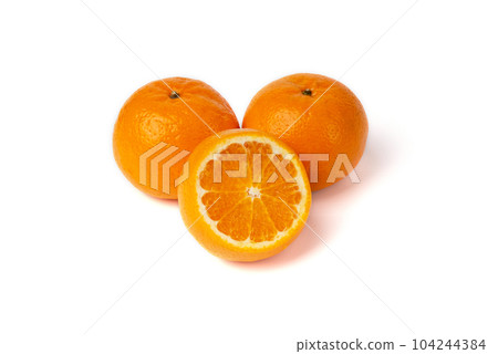 The orange fruit is isolated on a white background with orange slices. 104244384