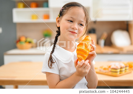 Children making bread in kitchen, Kids learning kitchen skill Children making bread in kitchen, Kids learning kitchen skill 104244445
