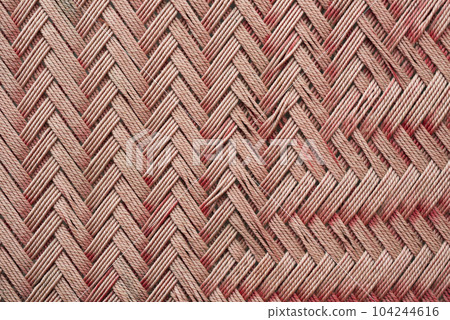 Red cotton rope pattern interwoven for making traditional beds. Red cotton rope pattern interwoven for making traditional beds. 104244616