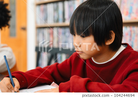 Kids education knowledge, Child in classroom at school Kids education knowledge, Child in classroom at school 104244694