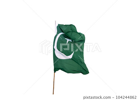 Pakistan's national flag flies in the sky. 104244862
