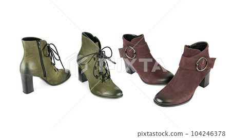 A pair of elegant ankle boots isolated on a white . Collage. A pair of elegant ankle boots isolated on a white . Collage. 104246378