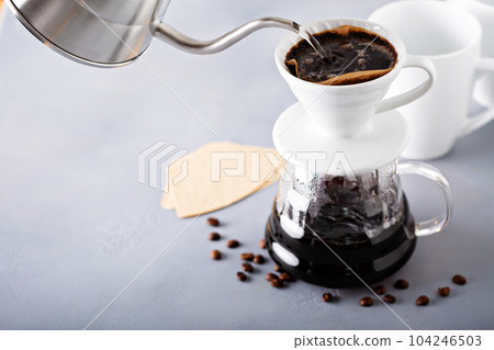Pour over coffee being made Pour over coffee being made 104246503