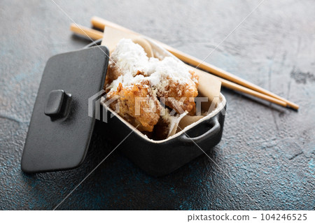 Asian style fried donuts with powdered sugar Asian style fried donuts with powdered sugar 104246525