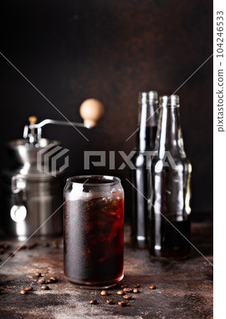 Cold brew iced coffee in glass bottles 104246533