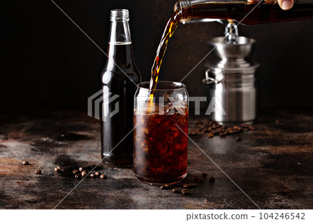 Cold brew iced coffee in glass bottles 104246542