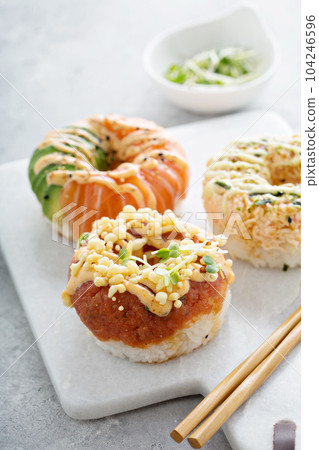 Sushi donuts with tuna and salmon Sushi donuts with tuna and salmon 104246596