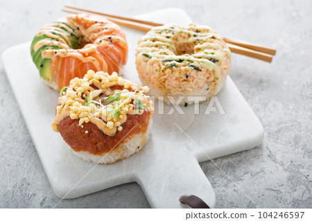 Sushi donuts with tuna and salmon Sushi donuts with tuna and salmon 104246597