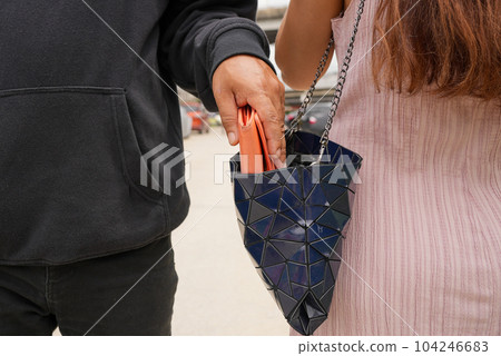 Man robbed woman, Thief stealing in public 104246683