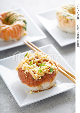 Sushi donuts with tuna and salmon Sushi donuts with tuna and salmon 104247569