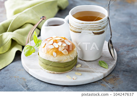 Sweet bun with almonds Sweet bun with almonds 104247637