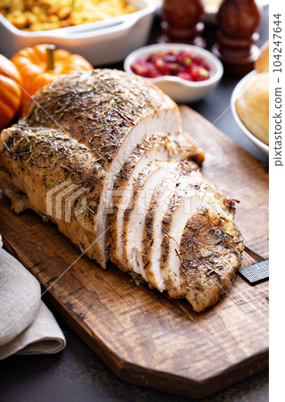 Roasted turkey breast sliced 104247644