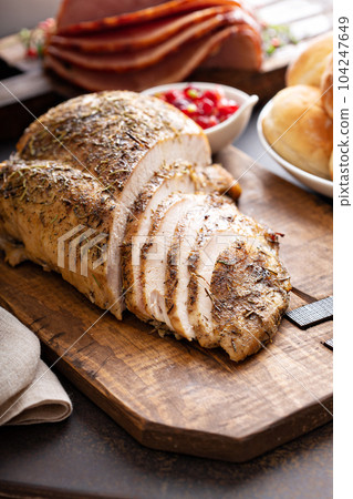 Roasted turkey breast sliced 104247649