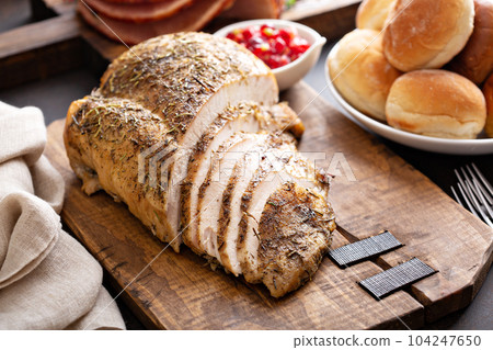 Roasted turkey breast sliced Roasted turkey breast sliced 104247650