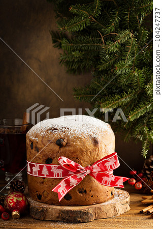 Traditional Christmas panettone with dried fruits 104247737