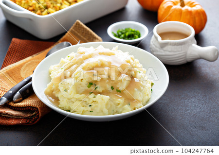 Mashed potatoes with gravy for Thanksgiving 104247764