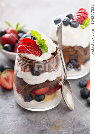 Chocolate pudding layered dessert 104247828