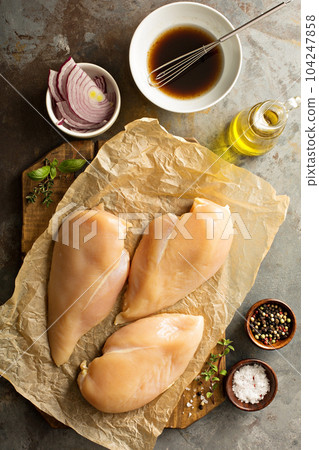 Cooking with chicken breast 104247858