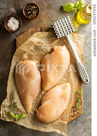 Cooking with chicken breast 104247859