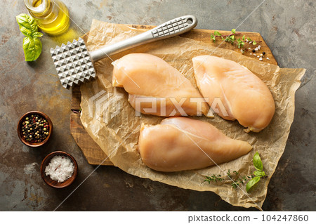 Cooking with chicken breast 104247860