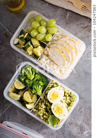 Healthy meal prep containers with chicken and rice Healthy meal prep containers with chicken and rice 104247865