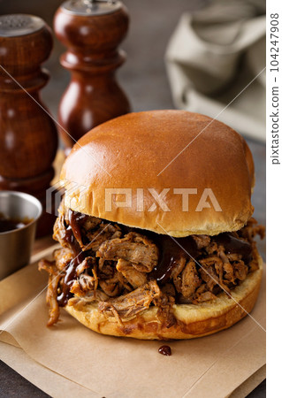 Pulled pork sandwich with bbq sauce 104247908