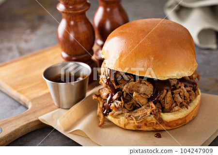 Pulled pork sandwich with bbq sauce Pulled pork sandwich with bbq sauce 104247909