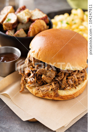 Pulled pork sandwich with bbq sauce 104247911