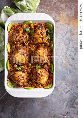 Arroz con Pollo, seared chicken with spanish rice 104247929