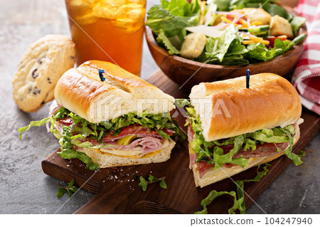 Italian sub sandwich with chips Italian sub sandwich with chips 104247940