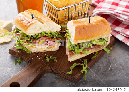 Italian sub sandwich with chips Italian sub sandwich with chips 104247942