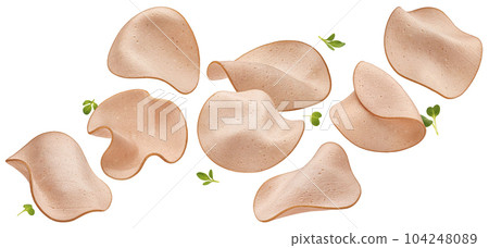 Falling sausage thin slices isolated on white background 104248089