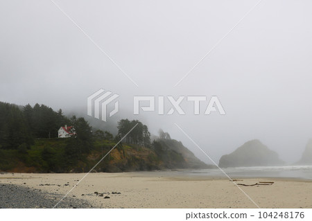Foggy coast on a cloudy day in Oregon. Foggy coast on a cloudy day in Oregon. 104248176