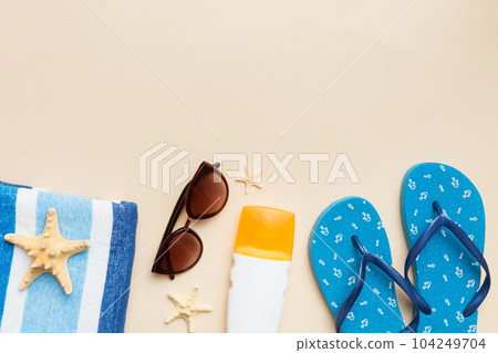 Summer vacation concept flat lay. beach accessories and towel top view. Space for text. travel concept Summer vacation concept flat lay. beach accessories and towel top view. Space for text. travel concept 104249704