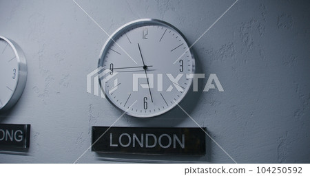 White watches with running time pointers show time White watches with running time pointers show time 104250592